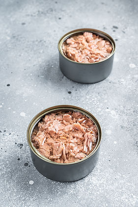 open-tin-can-with-canned-tuna-fish-gray-background-top-view.jpg