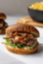 Gourmet Hamburger with Balsamic Glaze, Caramalized Onions, Arugula & Mozarella Cheese