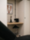 Treatment room with desk and ergonomic chair setup