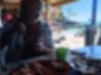 Relaxing lunch on the beach of Mong Tay island after morning snorkeling
