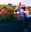 private speedboat snorkeling trip at buom reef, south phu quoc, clear turquoise water and tropical scenery