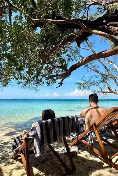 Relaxing on Starfish Beach with the pristine, untouched Phu Quoc National Park as the back