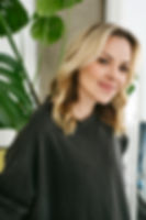 Blonde woman smilin in fort Lauderdale hair salon Hair with Flair Studio