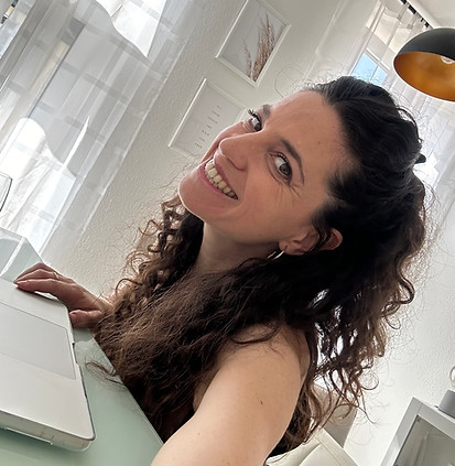 with computer in dresden white room.jpg