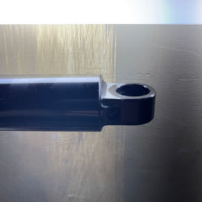 Shock eyelet edge machining