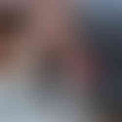 Man setting up video equipment for video shoot