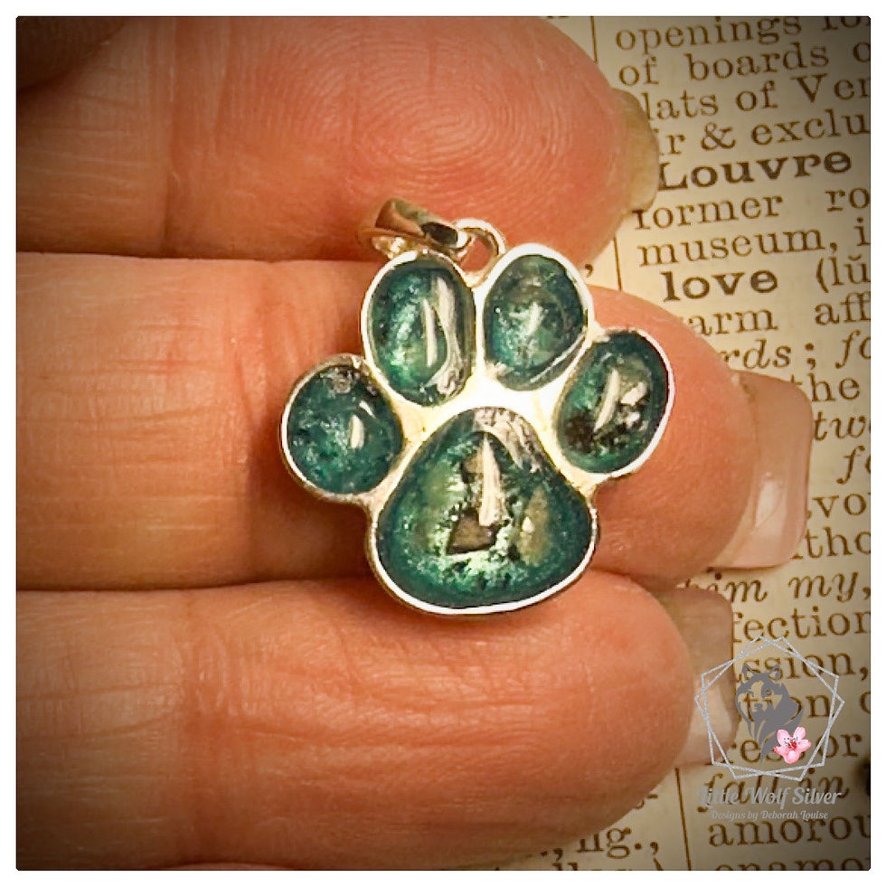 Thumbnail: Paw Pendant