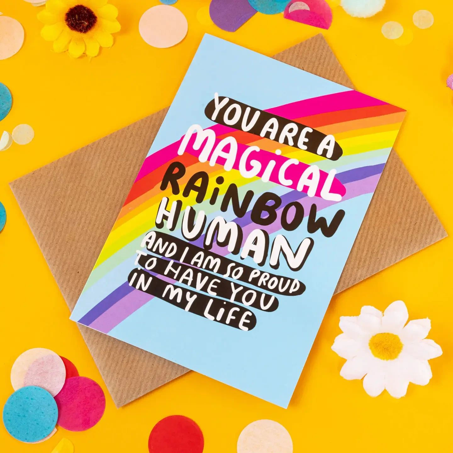 You are a magical rainbow human card with text and a rainbow background.
