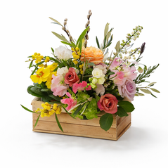 Spring table centrepiece with primroses