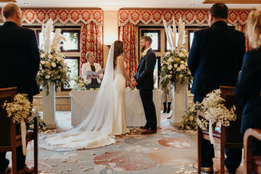 Striking multiple florals for the Ceremony at South Lodge