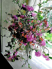 Floral arrangment for events wit pink and fuschia flowers by Mambo fiori best wedding florist Temecula CA