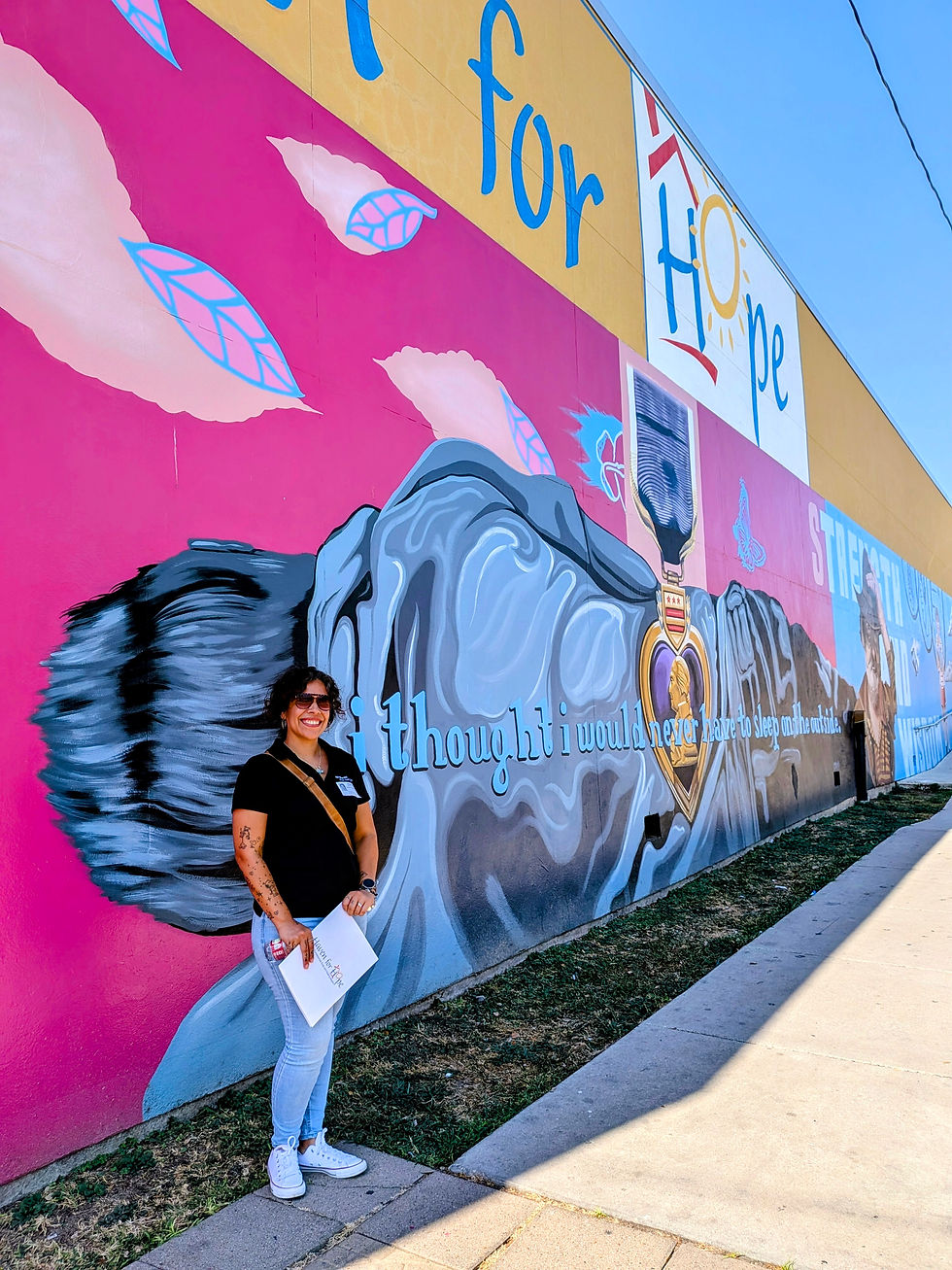 Leann Nicole outside Haven for Hope in San Antonio, Texas, supporting community outreach and nonprofit partnerships