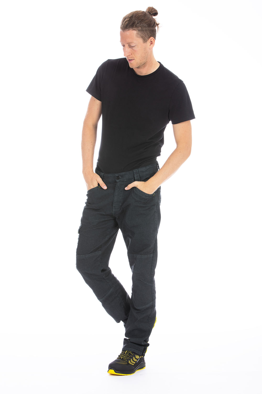 Man in black t-shirt and dark premium workwear pants