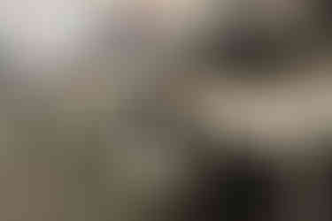 Office workstation with dual monitors and ergonomic chair in modern workspace