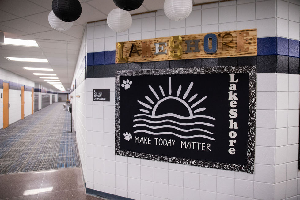 Black and white mural with sun and "Lakeshore" text.