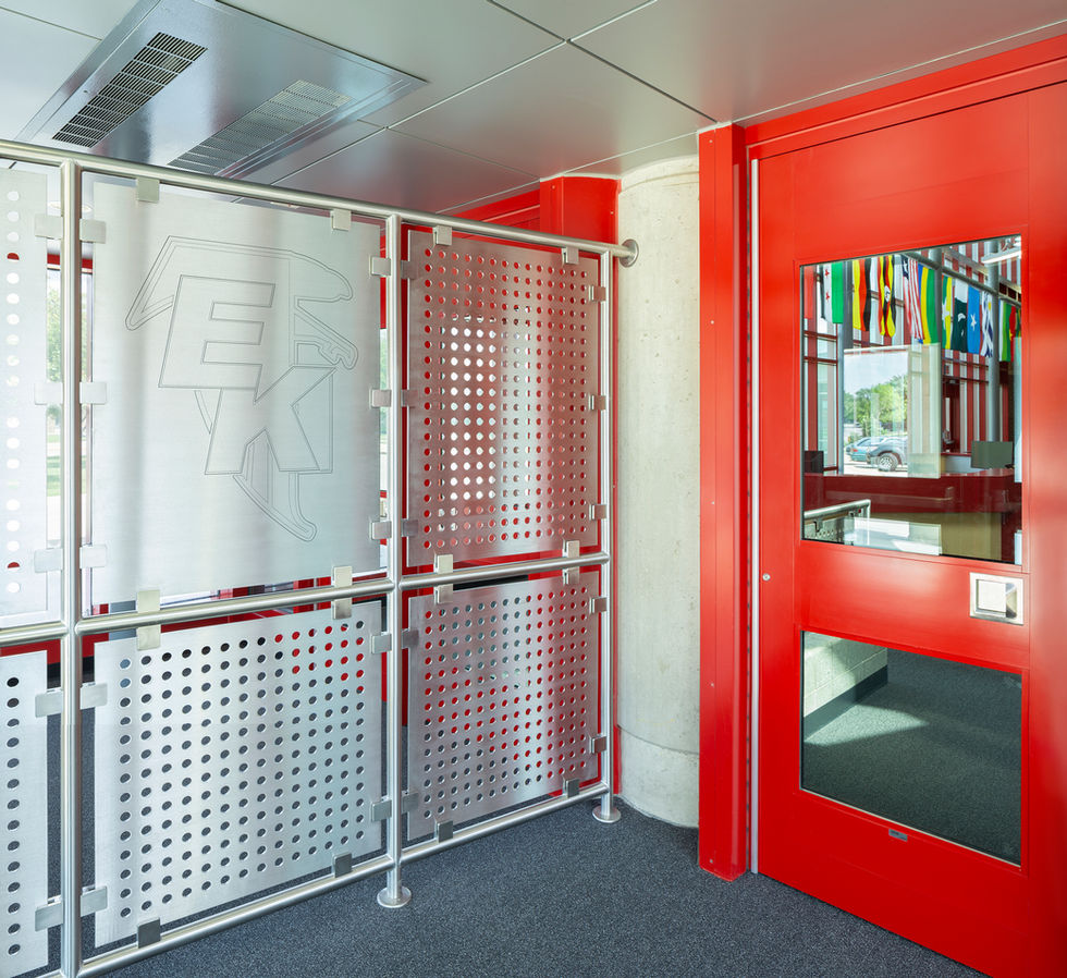 Red and white modern interior with metal accents.