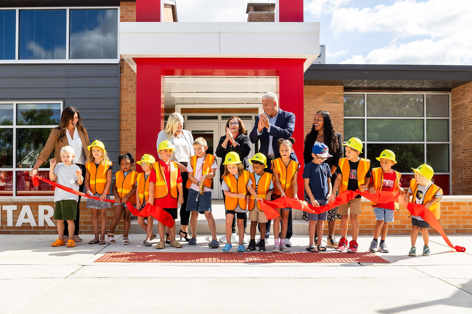 Students and staff gathered for Hamilton Elementary ribbon cutting ceremony