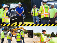 Construction crew participating in jobsite safety training with MIOSHA consultant at Kentwood Public Schools, emphasizing PPE and hazard awareness