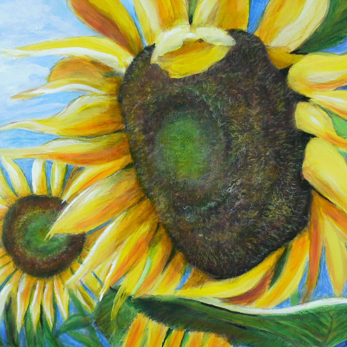 Bright yellow sunflowers dancing in the wind