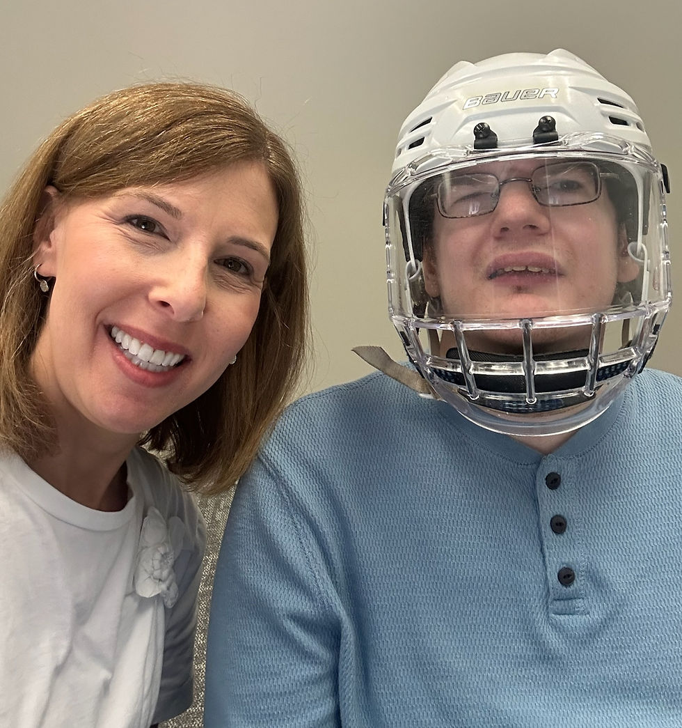Jeremy and Anne face us with big smiles on their faces.