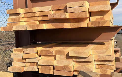 Cedar and juniper boards and landscape ties.