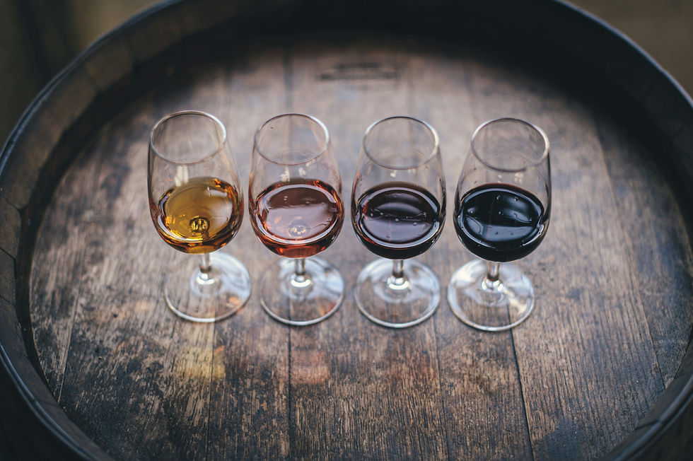 wine tasting glasses on barrel.jpg