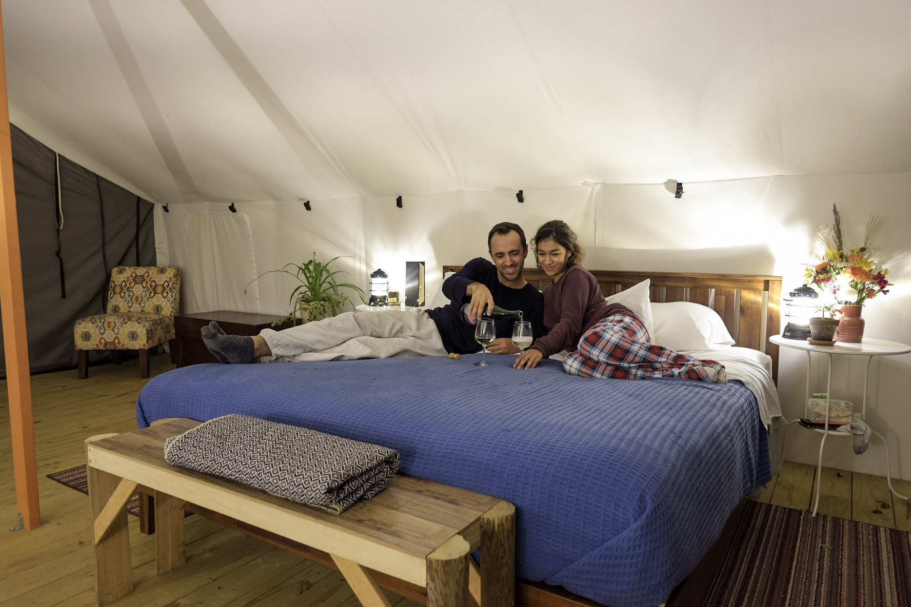 Inside a furnished safari tent at Seneca Sol
