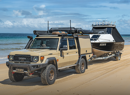 79 series landcruiser towing on the beach
