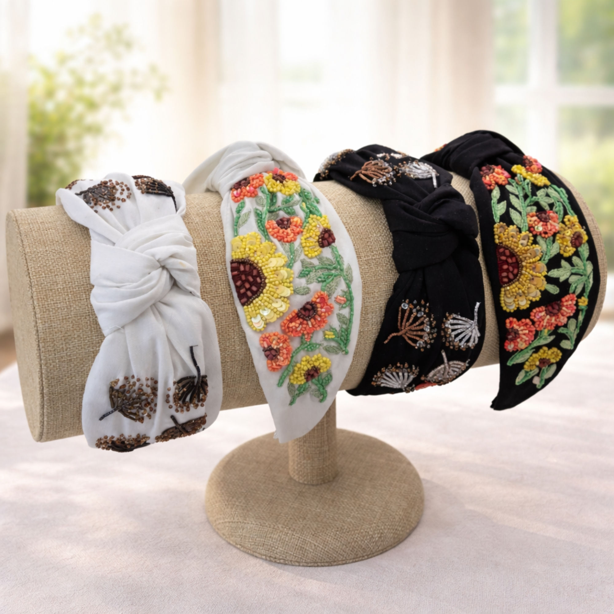 Beaded and embroidered top knot headbands for women for the fall season.