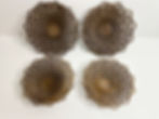 Four brown spiraling geometric decorative circles