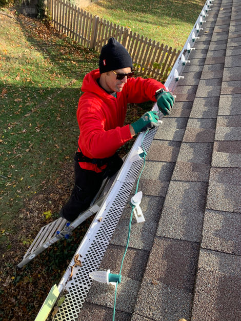 Christmas lights on gutter guards. Plaza Lights Tropical Christmas Lights. Ladders. Firefighter lights holiday Put up my christmas lights 