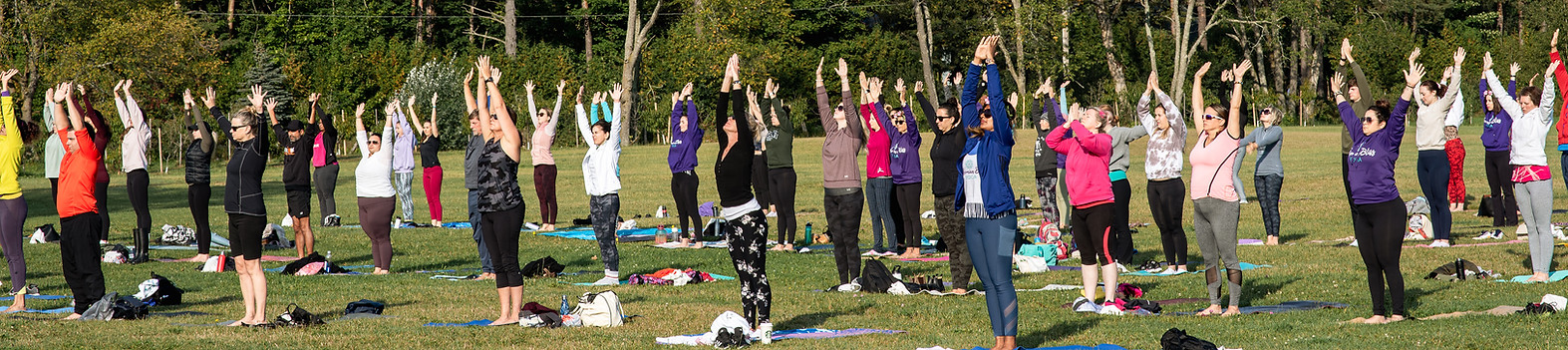 Outdoor yoga class at Bohemian Bliss Yoga. Join the best yoga studio in Whitby/Oshawa/Ajax for wellness & mindfulness.