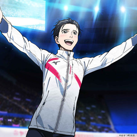 Yuuri Katsuki celebrates on the ice rink in Yuri!!! on Ice, symbolizing the joy of emotional expression through skating.