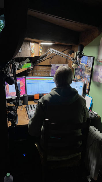 David hosting his radio show