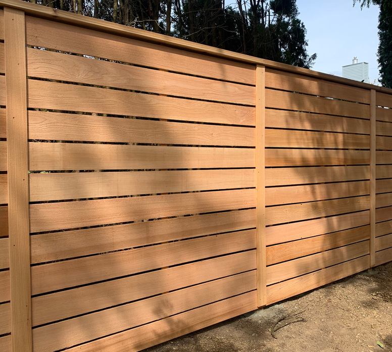 Lake Oswego property featuring warm-tone horizontal cedar fence