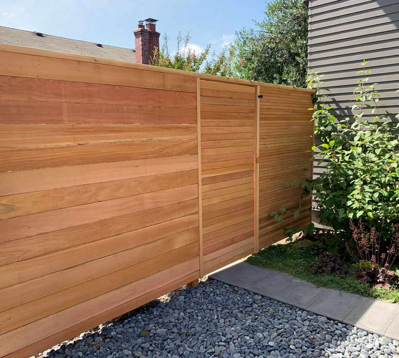 Horizontal cedar privacy fence with clean lines in Lake Oswego