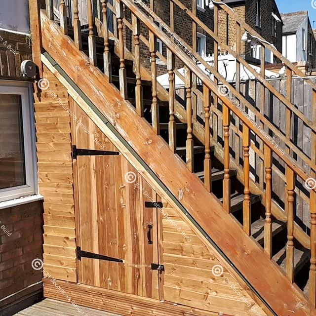 JGM Decorating Design & Build. Shed under stairs