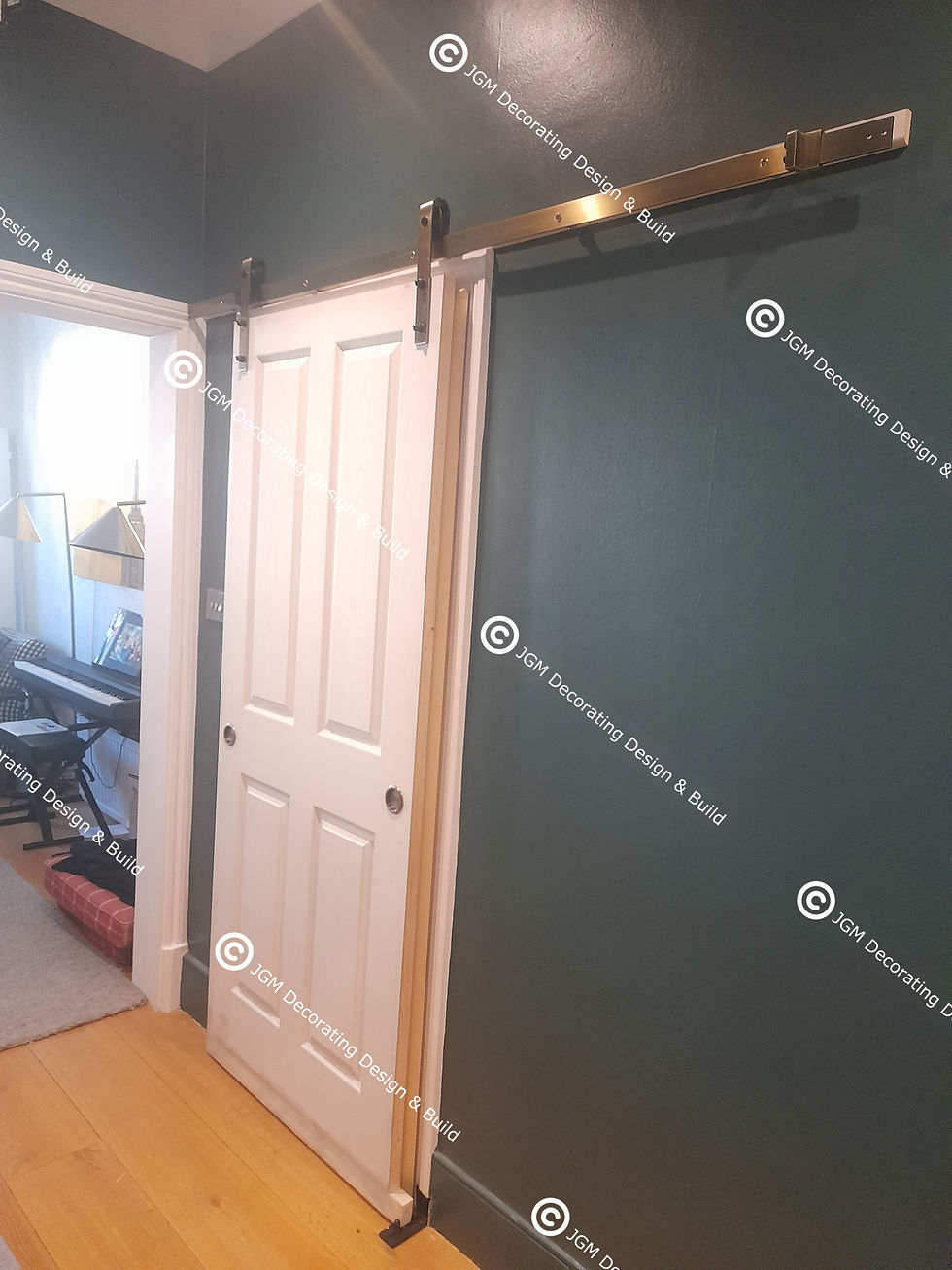 JGM Decorating Design & Build. Sliding door solution