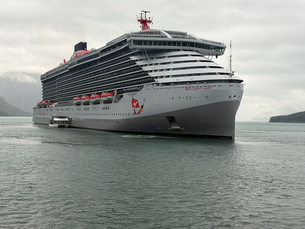 Virgin Voyages Brilliant Lady sailing during her inaugural 2026 Alaska season.
