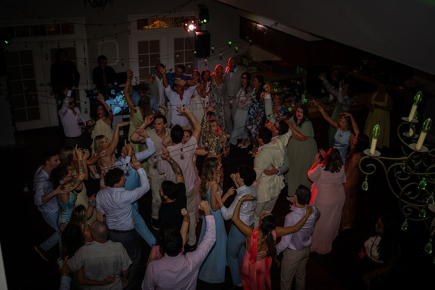 Packed dance floor with people at wedding party enjoying the dj music in Orlando Central F