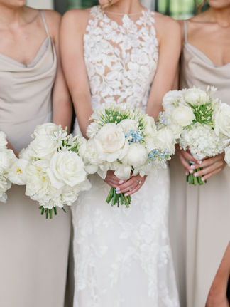 Bride and bridesmaids bouquets by Garden by the Gate Floral Design for wedding at Gervasi Vineyard in NOrth Canton OHio. Images-Kristin Leanne Photography, Planner-Sirpilla Soirees
