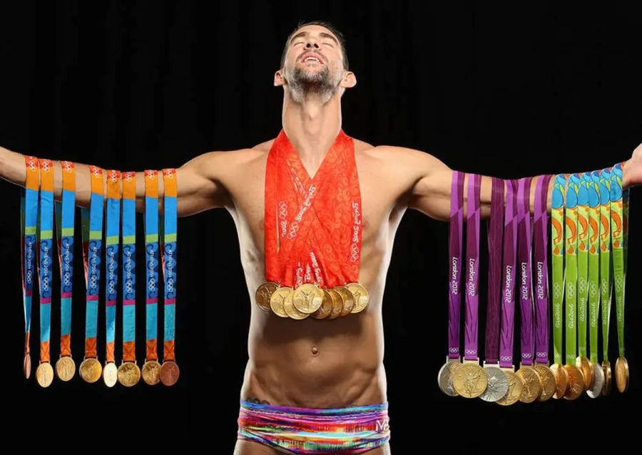 Michael Phelps showing all his Olympic medal