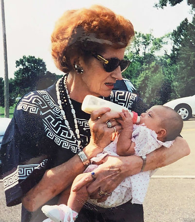 Photo of Madelyn and her great grandmother mary Rose as a baby.