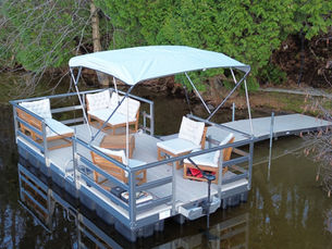 Boat moored to a dock with fenders installed for protection