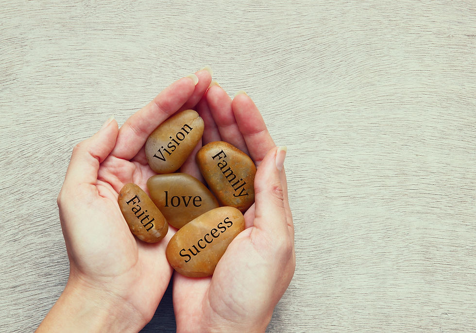 Hands Holding Inspirational Stones