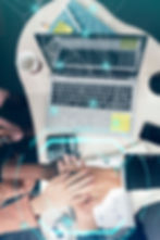 hands on top of each other signaling teamwork business concept