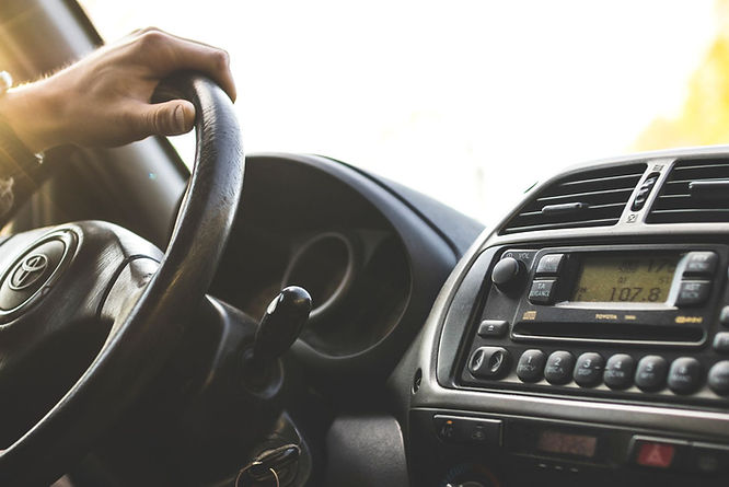 A person driving a car.