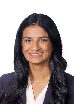 Headshot of Ambika Nohria, Advisory Board Member, with long dark hair, wearing a dark top against a light background