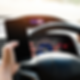 Person Driving & looking at their mobile