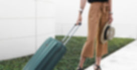 Stylish Woman with Luggage